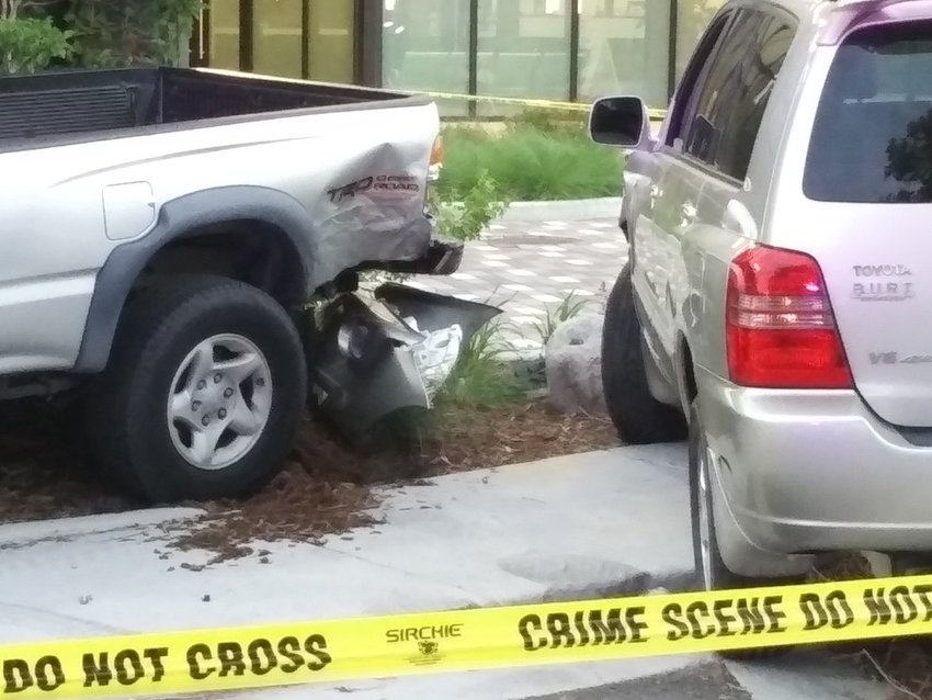 Damage after a car crash at Englewood Police Department headquarters.
